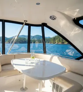 C Weed aft deck outdoor dining area with Vancouver mountain views